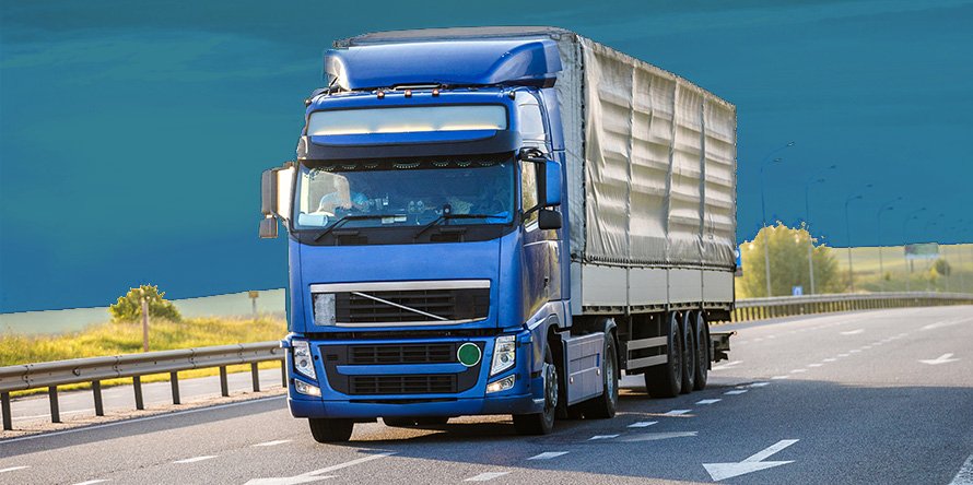 Blue moving truck on highway, symbolizing Aus City Movers' interstate transport services across Australia.